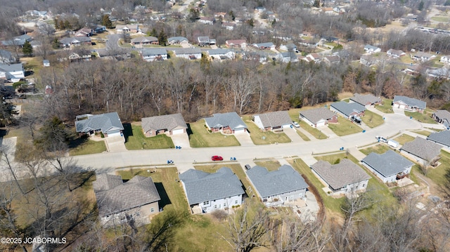 birds eye view of property with a residential view