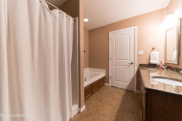 full bathroom featuring baseboards, a shower with shower curtain, a garden tub, tile patterned floors, and vanity