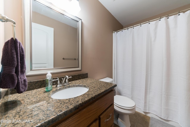 bathroom with tile patterned flooring, a shower with shower curtain, toilet, and vanity