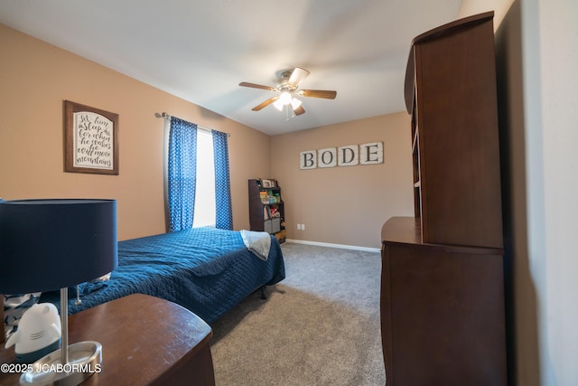 bedroom featuring ceiling fan, baseboards, and carpet