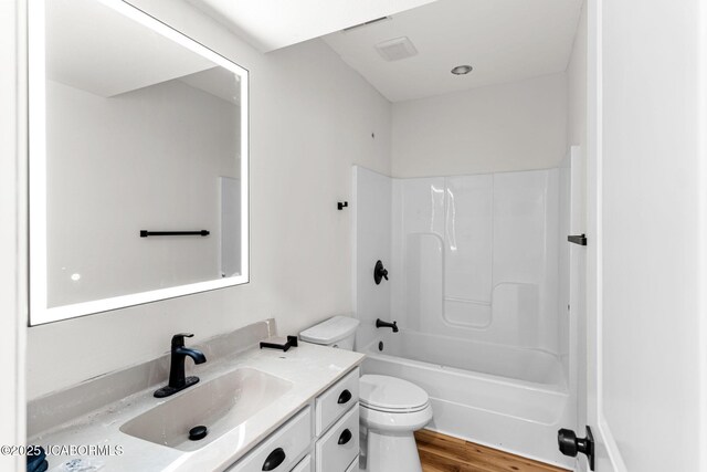 600 Peterson Ln, Ashland, MO 65010 - bathroom featuring vanity, wood finished floors, and bathing tub / shower combination