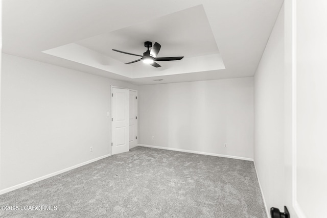 600 Peterson Ln, Ashland, MO 65010 - carpeted empty room featuring a raised ceiling, a ceiling fan, and electric panel