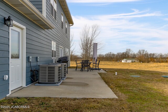 view of front of home with a garage, a front yard, and covered porch