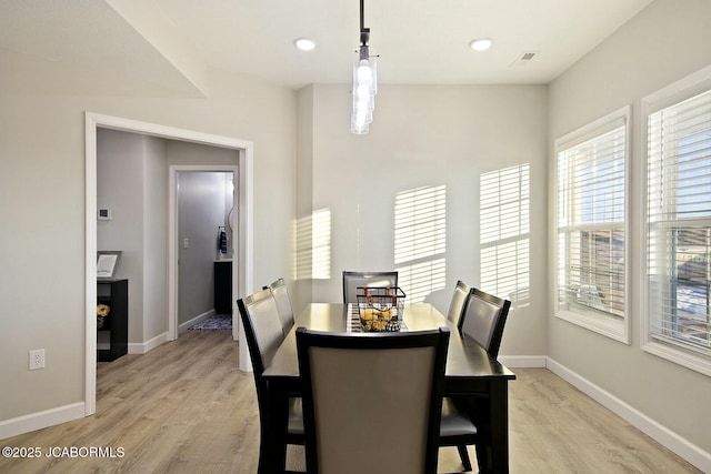 dining room featuring light hardwood / wood-style floors