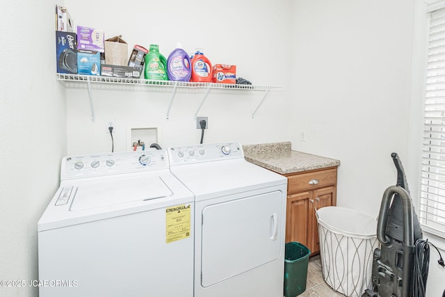 2414 Camzie Dr, Jefferson City, MO 65101 - laundry area featuring cabinet space and independent washer and dryer