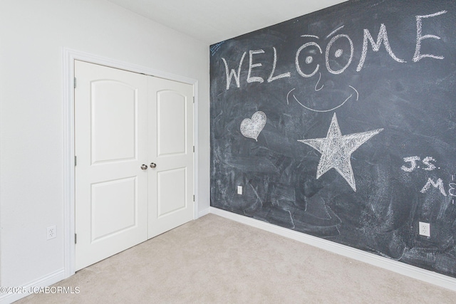 2414 Camzie Dr, Jefferson City, MO 65101 - bedroom with carpet floors and a closet
