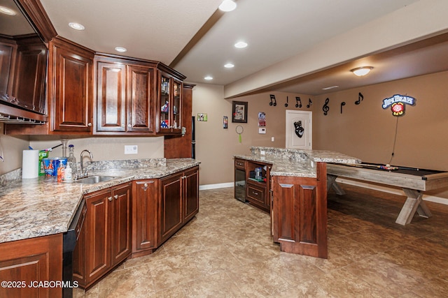2414 Camzie Dr, Jefferson City, MO 65101 - kitchen featuring baseboards, dishwasher, a sink, recessed lighting, and light stone counters