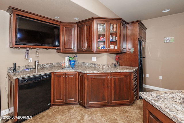 2414 Camzie Dr, Jefferson City, MO 65101 - kitchen with glass insert cabinets, baseboards, black appliances, and light stone countertops