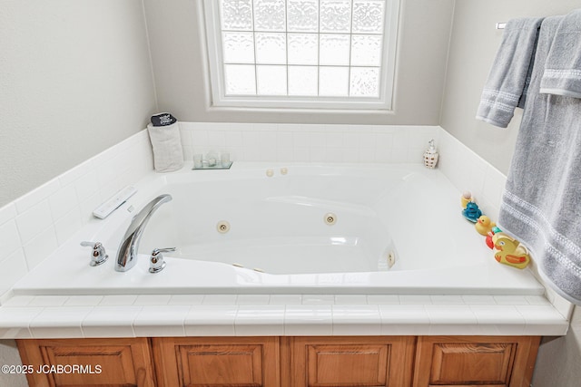 2414 Camzie Dr, Jefferson City, MO 65101 - full bathroom with a tub with jets