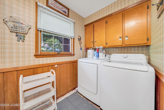 409 Lorene St, California, MO 65018 - washroom with wallpapered walls, cabinet space, washer and dryer, and wainscoting