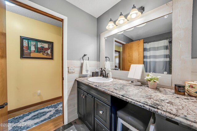 409 Lorene St, California, MO 65018 - bathroom featuring vanity and wood finished floors