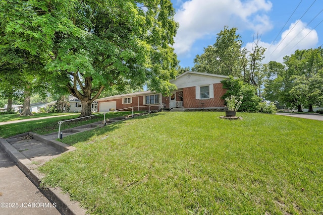 409 Lorene St, California, MO 65018 - single story home with an attached garage, brick siding, a front yard, and covered porch