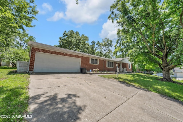 409 Lorene St, California, MO 65018 - ranch-style house featuring driveway, a garage, and brick siding