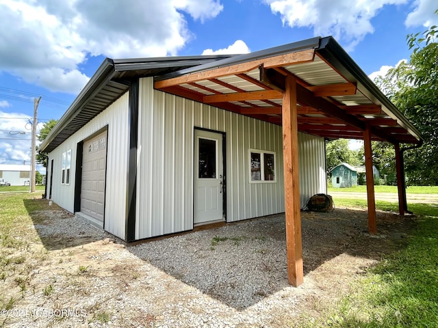 view of outdoor structure with a garage