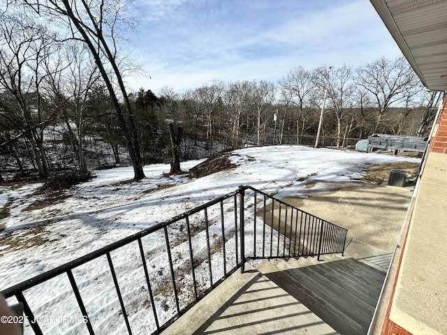 view of snow covered deck