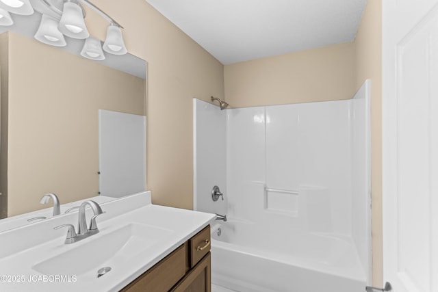 bathroom with vanity and shower / washtub combination