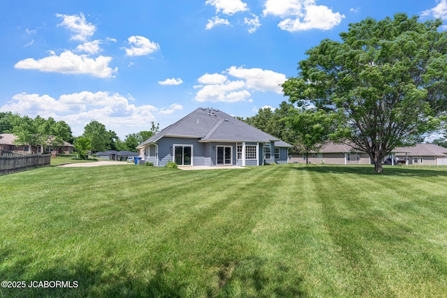 600 Redwing Dr, Ashland, MO 65010 - rear view of property with a lawn and a patio