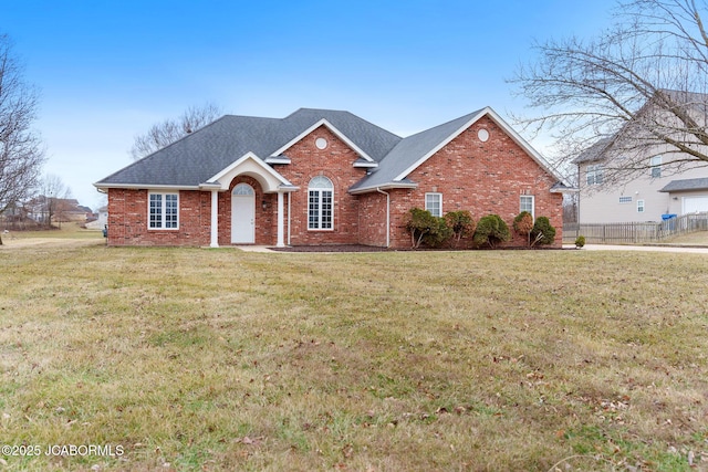 view of front of home with a front lawn