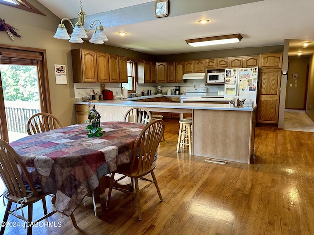 145 W Cedar Tree Ln, Hartsburg, MO 65039 - living area with high vaulted ceiling, ceiling fan, and a stone fireplace