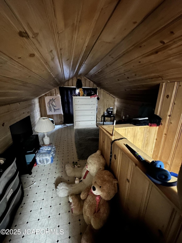 bonus room with bar, wooden walls, wooden ceiling, and vaulted ceiling