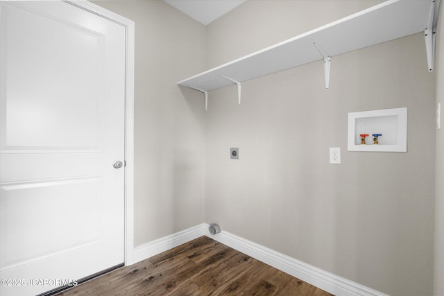 clothes washing area with electric dryer hookup, hookup for a washing machine, and dark hardwood / wood-style floors