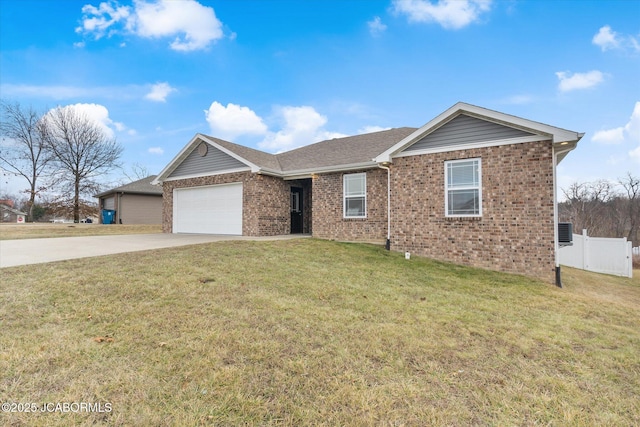 single story home featuring a garage and a front lawn