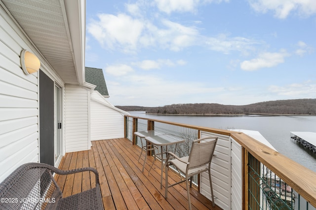 deck featuring a water view