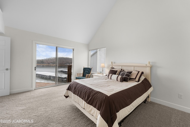 bedroom with baseboards, carpet, and access to exterior