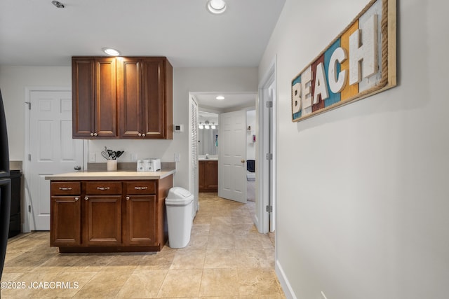 bar featuring baseboards and recessed lighting