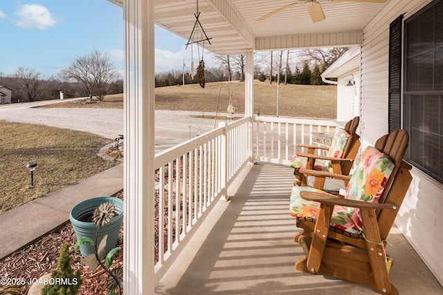 view of patio featuring covered porch and ceiling fan