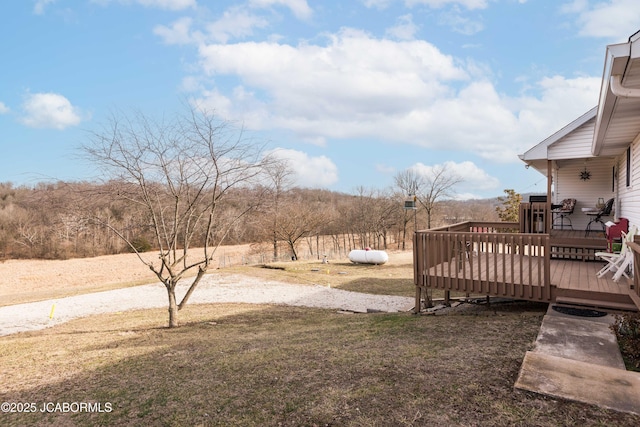 view of yard with a deck