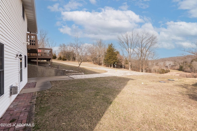 view of yard with a deck