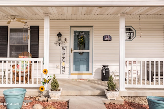 view of exterior entry featuring a porch