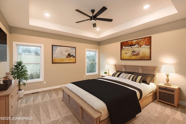 5610 Birch Creek Ln, Jefferson City, MO 65101 - bedroom featuring light colored carpet, a tray ceiling, baseboards, and recessed lighting