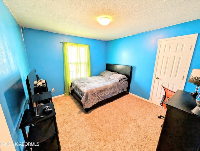 carpeted bedroom with a textured ceiling