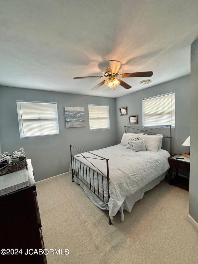 bedroom featuring carpet and ceiling fan