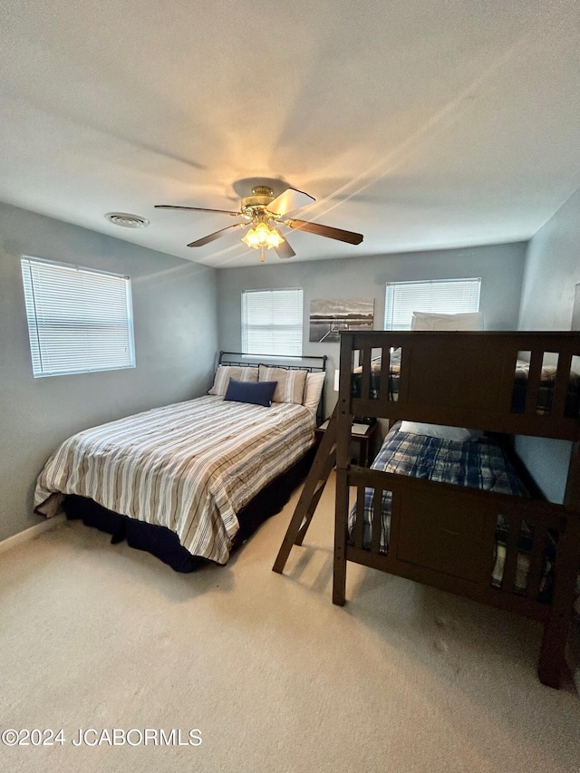 bedroom with carpet floors and ceiling fan