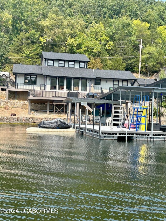 view of dock with a water view