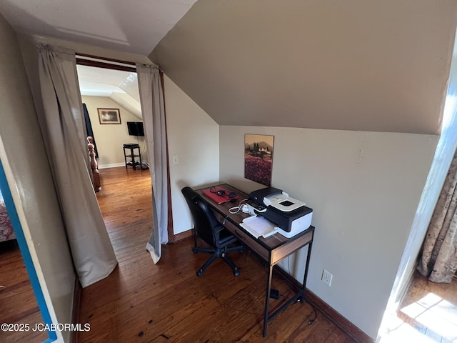 office with vaulted ceiling, wood finished floors, and baseboards