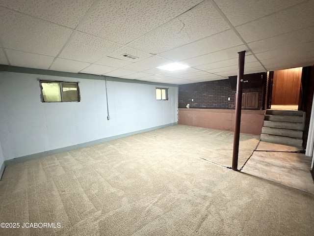 2412 Scenic Dr, Jefferson City, MO 65101 - basement with a paneled ceiling, carpet, and stairs