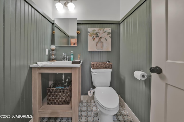 1308 Haxby Ct, Columbia, MO 65201 - bathroom with toilet, baseboards, tile patterned floors, and a sink