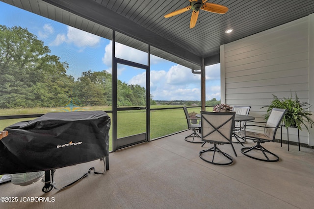 1308 Haxby Ct, Columbia, MO 65201 - sunroom / solarium featuring ceiling fan, outdoor dining space, and beam ceiling