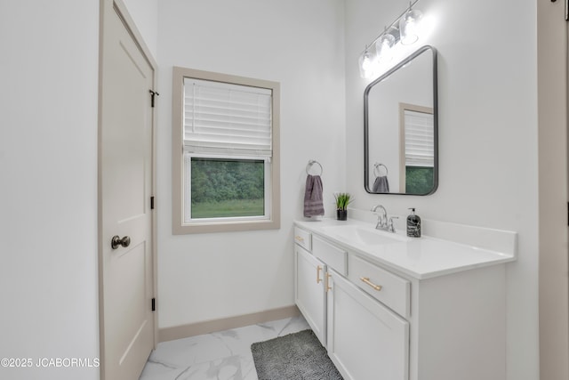 1308 Haxby Ct, Columbia, MO 65201 - bathroom featuring marble finish flooring, vanity, and baseboards