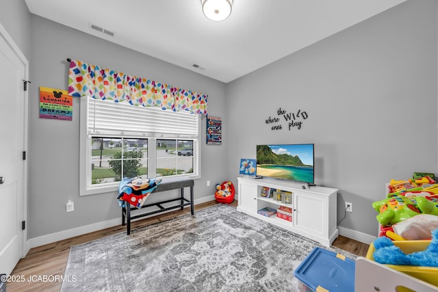 1308 Haxby Ct, Columbia, MO 65201 - rec room featuring light wood-type flooring and baseboards