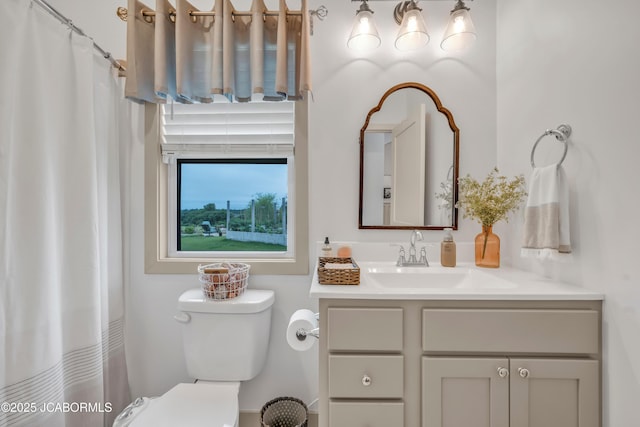 1308 Haxby Ct, Columbia, MO 65201 - bathroom with vanity, toilet, and a shower with shower curtain