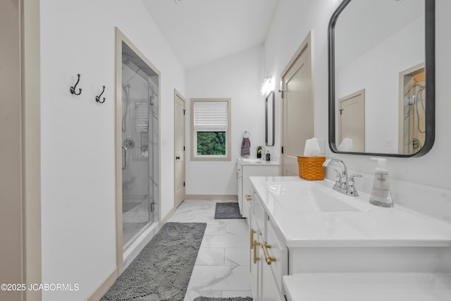 1308 Haxby Ct, Columbia, MO 65201 - full bathroom featuring marble look tile flooring, a shower stall, two vanities, vaulted ceiling, and baseboards