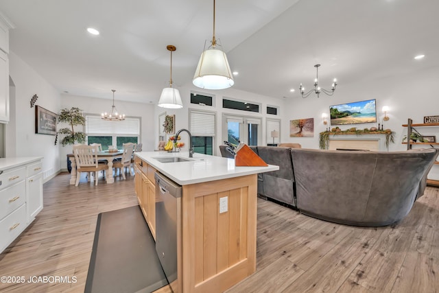 1308 Haxby Ct, Columbia, MO 65201 - kitchen with a sink, a chandelier, dishwasher, light wood-style flooring, and recessed lighting