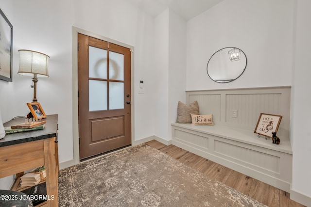 1308 Haxby Ct, Columbia, MO 65201 - entryway with wood finished floors and a wainscoted wall