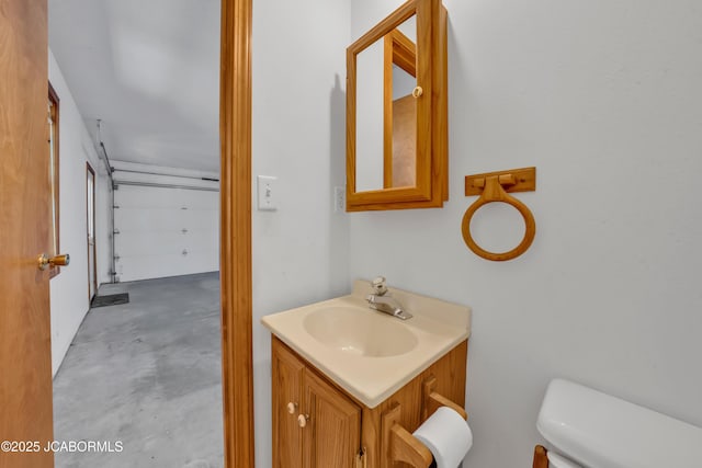 29311 State Highway Pp, California, MO 65018 - bathroom featuring concrete flooring, vanity, and toilet