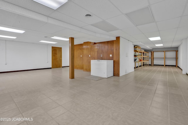 29311 State Highway Pp, California, MO 65018 - empty room featuring a drop ceiling and wooden walls